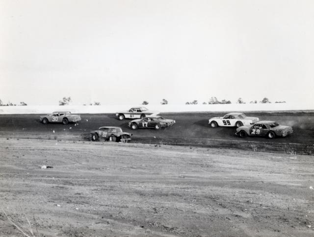 1968 - Aden Erb spins as Billy Collins, Johnny Jackson, Larry Rogero, Benny Moore & Eldon Yarbrough pass (Don Bok Photo)
