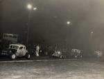 Flagman Rosebud Flower lines up the cars in 1959...