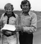 Pete Keller (L) and track owner Billy Herndon (R) with the lease and sanctioning agreement in late 1974...