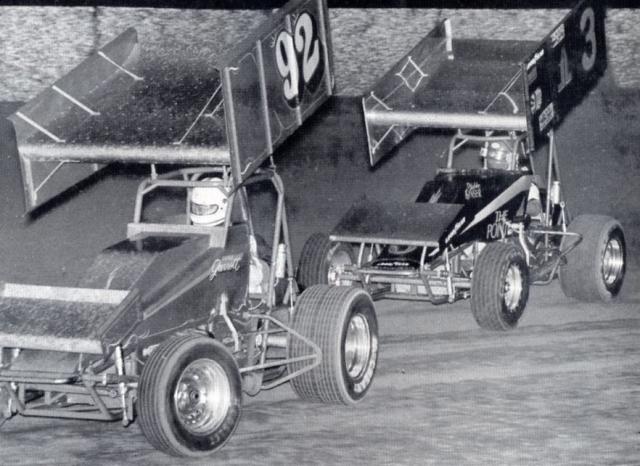 Harry Garrett leads Sheldon Kinser - 1986 Winternationals (Jim Chini Photo)