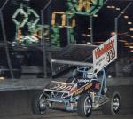Keith Kaufmann on the gas with the Florida State Fair rides as a backdrop - Feb. 1988 (Max Dolder Photo)