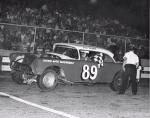 Jimmy Crowe takes a win in his Olds  (Dick Crowe Collection)