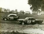 Robert Ashton with a shortened #16 Chevy battles the Dodge of Dick Joyce (Don Bok photo from the Allison collection)