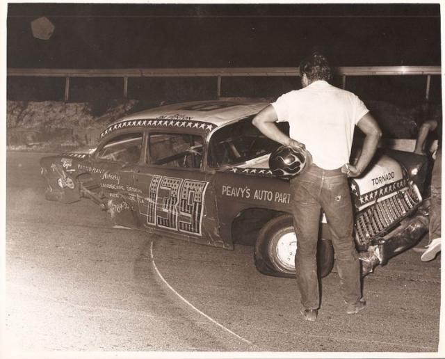 Big Jim Fenton looks over his Tornado car after a bout with the wall in May of 1972 (Jim Fenton Collection)
