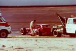 Former NASCAR Modified champion Jerry Cook surveys damage after a World Series practice crash (Westerman Photo)