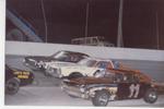 "A" Bomber action with Dave Waddell sandwiched between the father/son team of Jimmy Johns and Rick Johns #11..