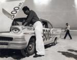1958 - A mechanic works on Phil Orr's 1958 Ford before the GN race (Orr Family Collection)