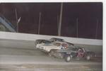 Barbara Pierce battles Dave Waddell in "A" Bomber action...