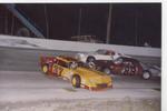 Gary Schlichter spins in front of Wayne Marshall..