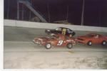 Bobby Sears #9 leads Carl "Peanut" Green #15 and Dink Sullivan in Mini Stock action...