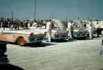 DePaolo race team preps for the 1957 Convertible race... (L-R) Marvin Panch, Curtis Turner, Fireball Roberts and Joe Weatherly..