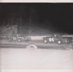 1966-67 - Dick Crowe leading Guy Mesito, Jr. who is driving with one arm... 
