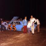Tiny Lund poses with a couple of his fans at Jacksonville Speedway...