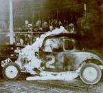 1959 from Illustrated Speedway News - Ernie Reeves' car catches fire (Marty Little Collection)