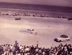 Wild 1952 GN action as Buck McCardell #250 gets out of control as Ed Samples #9 passes...