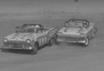 A pair of '57 Fords battle during the '58 Convertible race - Wilbur Rakestraw is in #999...