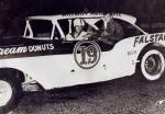 Billy Taylor gives a youngster a ride... check out the white sidewall tire...