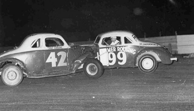 Herb Madray (99) in his Hudson coupe avoids a spinning car around 1957 (Marty Little Collection)