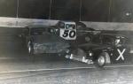 A 1961 Plymouth - driver unknown - spins between Paul Parker #50 and Skip Gibson #X...