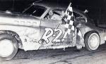 Red Begtrup with a 1966 checker at Gold Coast Speedway...