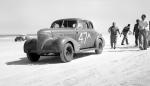 Tim Flock makes a pit stop during the 1956 Modified race...