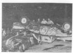 Buzzie Reutimann's car rests on top of Dale Alderman's machine - 1965 (Oscar Norton Photo)