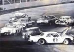 ...McInnis then goes for a spin as Billy Hancock in Al Stageburg's '57 Plymouth goes high to avoid...