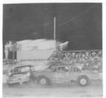 Robert Ashton gets into a sideways Ernie Bass right in front of the flag stand in 1966 (Harry Workman Photo)