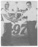 Red Farmer receives his trophy from Promoter Lou Trasport after winning the Memorial Day LM feature in 1966 (Ray Fenn Photo)