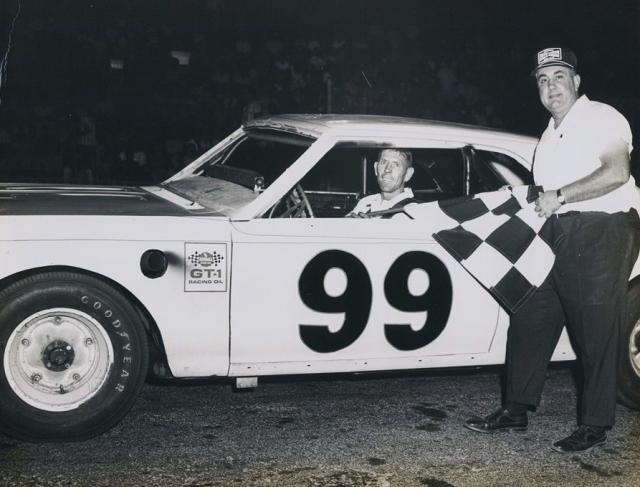 Wayne Niedecken, Sr. takes a checker...