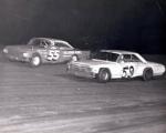 Tiny Lund #55 battles arch-rival Tiger Tom Pistone #59 at Jacksonville Speedway...