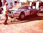 Working on Red Farmer's Fairlane in the pits - 1974 Snowball Derby (Courtesy Stacey Cook)