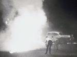 Burning off a fuel fire at Gold Coast Speedway in 1965 (Noel Sheffield Collection)