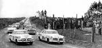 Tim Flock #300A and Speedy Thompson lead the pack to the start of the 1956 GN race - Flock won...