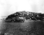 Spectators crowd the turn one hill in 1947 (State Archives of Florida)