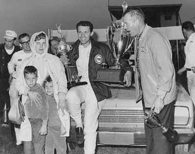 Richard Petty after winning the 1966 Daytona 500 while father, Lee, helps him celebrate with the family (Orlando Sentinel)