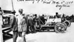 Cars lined up for the start of a race in 1908