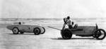 Sig Haugdahl in the Wisconsin Special being filmed on the beach in 1922