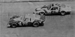 Richie Evans passes Alan West on his way to winning the 1980 Modified 200 (Mike Feinberg Photo)