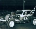 Marty Handshaw with his cutdown sedan with Olds power from he early 60s