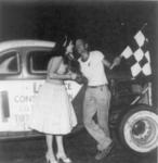Silvester "Sy" Coe after a win.  Coe was one of the few black racers in the Miami area in the 50s and early 60s..