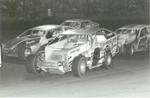 2-15-89  Bob McCreadie leads a pack of DIRT Modifieds...