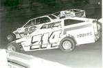 2-17-89  Three-wide in the Mods with Kevin Collins #16, Billy Schinkel #714 and Kenny Brightbill...