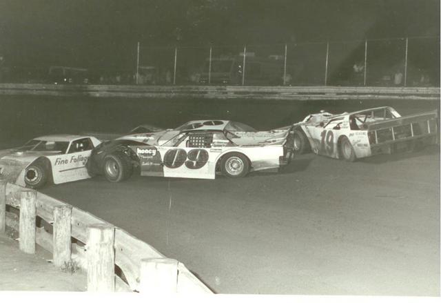 Steve Shuman, Rob Underwood and James Powell III mix it up (Don Bok Photo)
