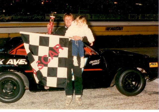 Jerry Symons with a Mini Stock victory (Jim Jones Photo)