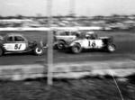 Larry Flynn #18 at Speedway Park in 1960. Rod Eulenfeld on the inside of Flynn, and Jack Nolan #51 (Mike Bell Photo)
