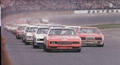Pole-sitter Cale Yarborough jumps out to an early lead at the start of the 1984 Daytona 500...