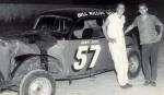Car owner Billy Wilcox and Bobby Brack pose in August 1958...