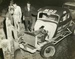 1963 - Jim Yarbrough inspects damage to his car (Yarbrough Collection - Courtesy Sonny Hartley)