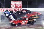 Rose Dickerson, or "Roll-Over Rose", does her thing as Kelly Jarrett #97, Derrick Reeves #11 and Conrad Grenier avoid.